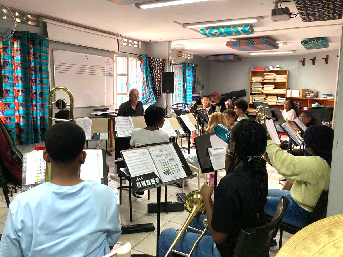 Milt Allen teaching Principles of Music to Classroom